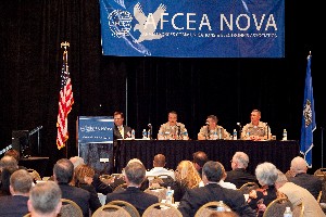A panel gathers for the chapter's Naval IT Day in June.